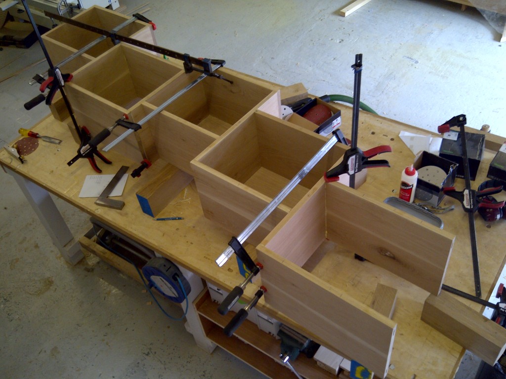Stepped cabinets handmade from solid oak for home office study